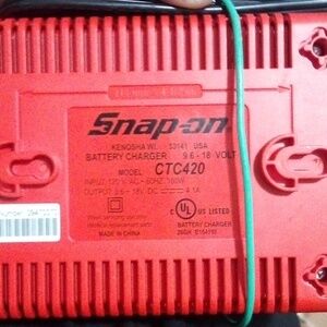 Snap on battery charger